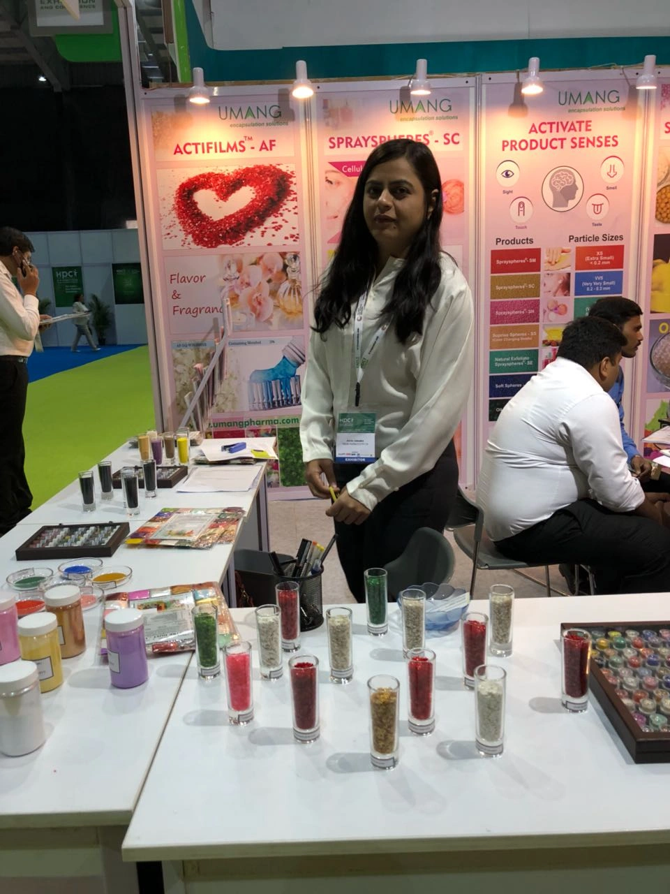 Industry professionals engaging with our team at the HPCI exhibition showcasing personal care trends